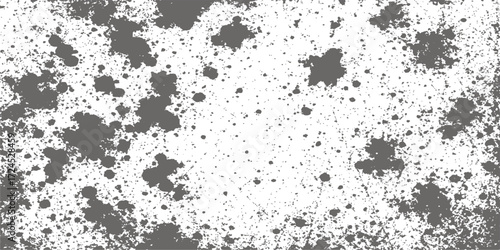 Dark, inky grunge texture on a dirty black and white background with a paint splatter pattern