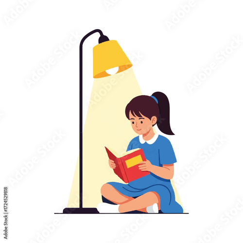 Girl sitting on the floor reading a book under a lamp.