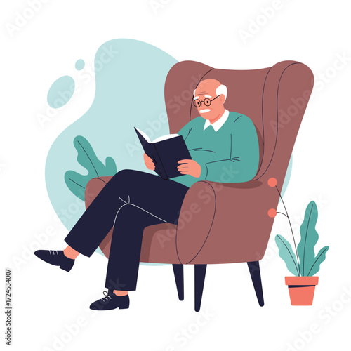 An elderly man is sitting in a comfortable armchair and reading a book.