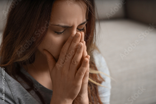 Wallpaper Mural Sad young woman at home, closeup Torontodigital.ca