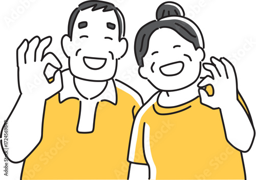okポーズをとる高齢夫婦