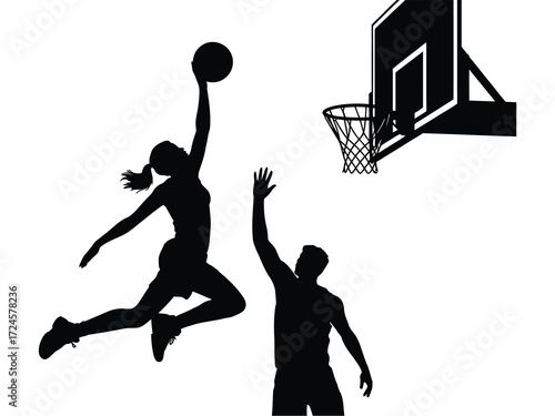 Silhouette of a woman dunking a basketball over a defender