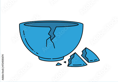 A broken blue bowl with pieces scattered around it.