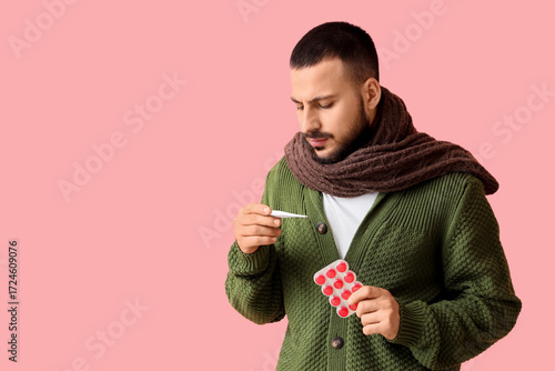 Ill young man with throat l...