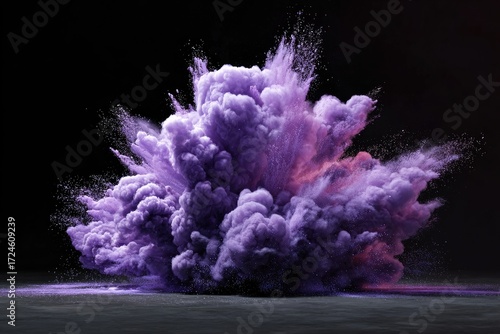 Violet powder explosion against black backdrop