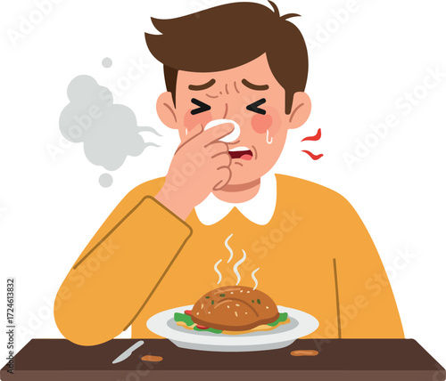 Man reacts to bad smell from food on a plate.