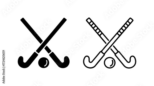 Two hockey sticks crossed one with a ball one without a ball simple design black and white sport equipment.