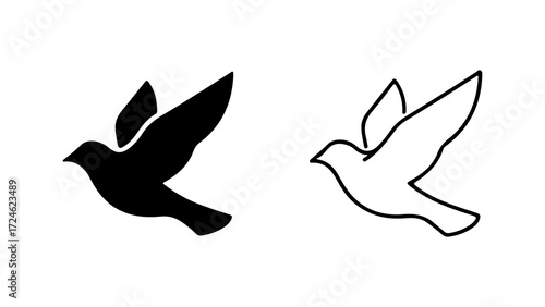 Two stylized bird silhouettes one black solid one white outline conveying peace and freedom.