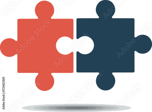 Two puzzle pieces connected together representing teamwork and collaboration.