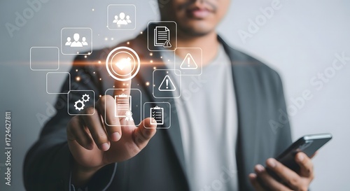 Businessman using digital interface for data analysis and hr management application access