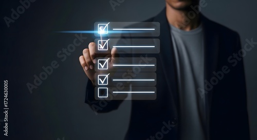 Man completing digital checklist online survey form with check marks and to do list app concept