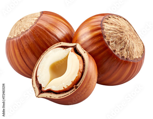 Three hazelnuts, one halved, showing inner nut