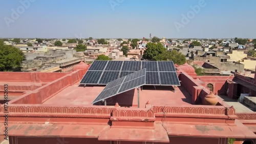 Solar panels on a rooftop in a town