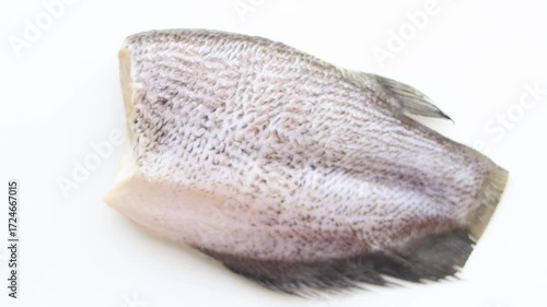 Top view of Freshly cut gourami fish on a white background. For Food