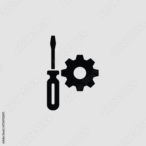 Black screwdriver and gear icon tool mechanical