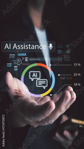 A person in a suit presents a futuristic holographic interface for an AI assistant. The display shows chat icons, data charts, and a voice command bar, all floating above their hand.