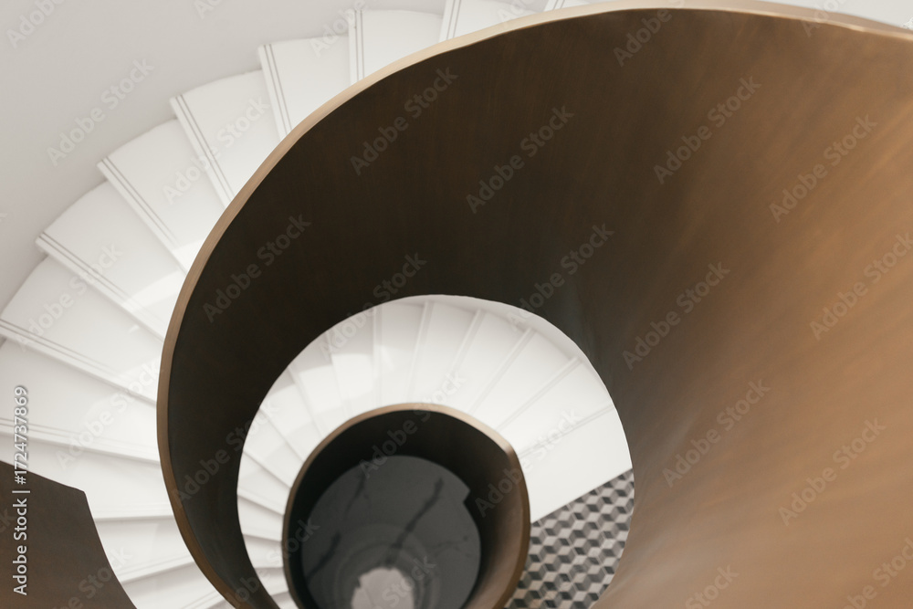 Fototapeta premium Spiral staircase with modern design and stylish interior renovation