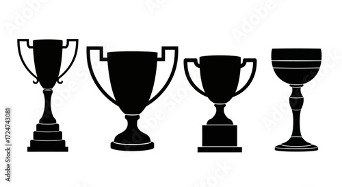 Collection of four silhouette trophies and award cups representing victory and achievement vector