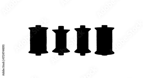 Four silhouette reels of film or thread isolated on for creative projects vector
