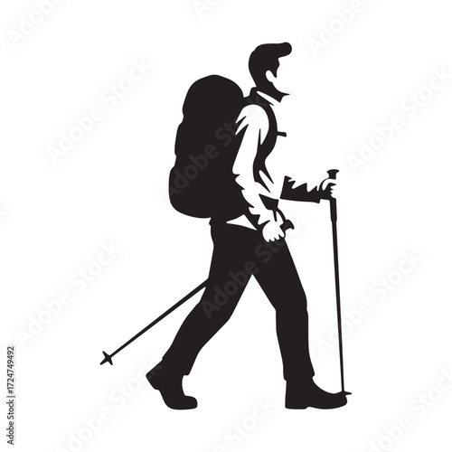 Silhouette of a hiker with backpack and trekking poles
