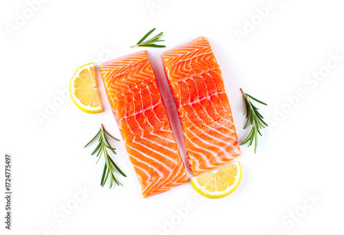 Fresh salmon fillet, spices and lemon slices on white background
