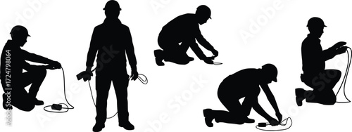 Silhouette workers with hard hats handling cables, electrical tools, installation and maintenance tasks, vector illustration for construction, labor, safety themes