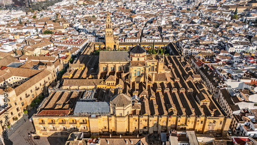 Aerial drone view of cityscape of Cordoba with Mosque-Cathedral, Mezquita Cathedral and skyline of Cordoba, Andalusia, Spain