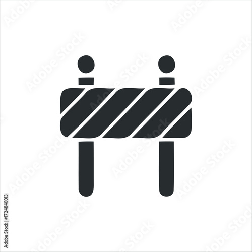 Black glyph roadblock icon with white background. Minimalist vector illustration of traffic barrier, perfect for road construction, warning signs, safety, and transportation des