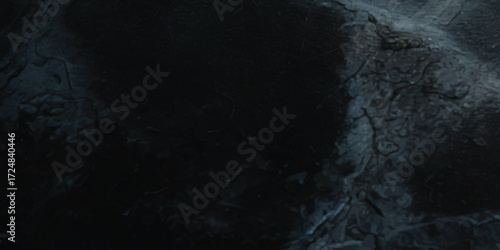 Abstract cracked stone texture with blue and gray tones, ideal for backgrounds, overlays, and creative design projects.