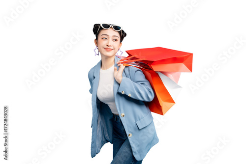 portrait Asian Woman enjoying a shopping spree while carrying colorful bags on PNG
