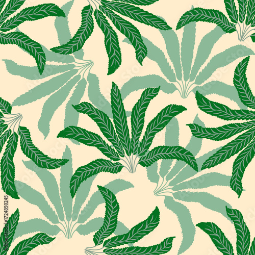 seamless pattern with green tropical leaves on a beige background, ideal for summer designs, fabric, and nature-inspired projects.