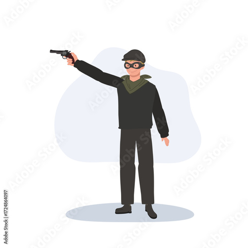 burglar bandit with pistol wearing mask dark clothing