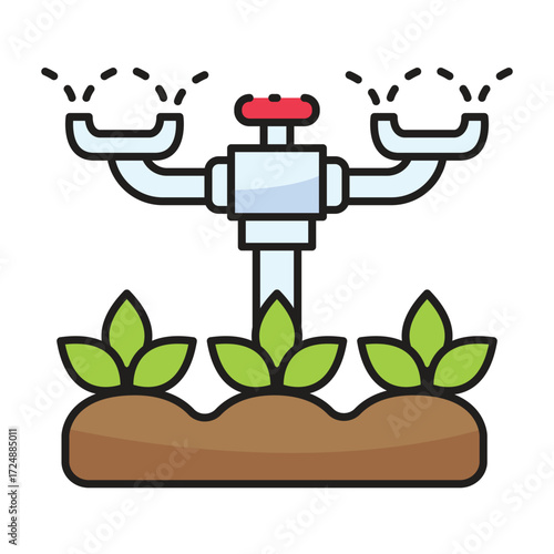 Sprinkler irrigating plants on a brown mound of soil