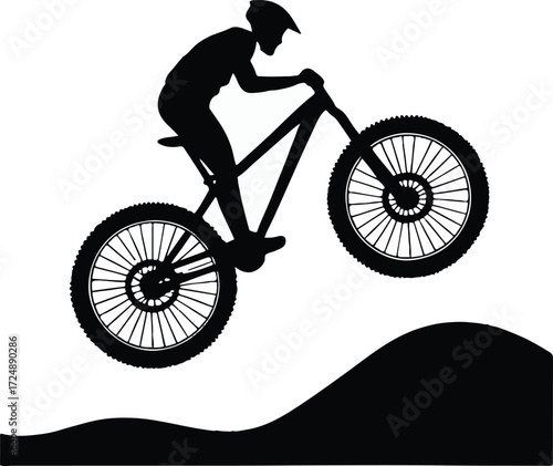Mountain biker jumping silhouette Keywords: mountain biker, cyclist, bicycle, bike, jumping