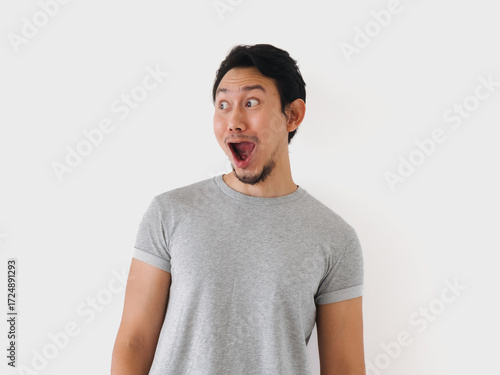 Man with a beard and a surprised expression on his face