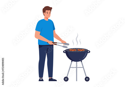 A man in a blue shirt is grilling sausages on a barbecue outdoors.