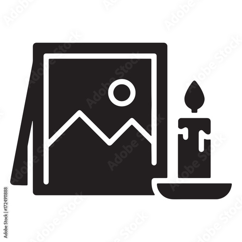 Memorial tribute icon with a framed photograph and a burning candle. A solid black glyph symbolizing loss, remembrance, paying respects, and honoring a memory