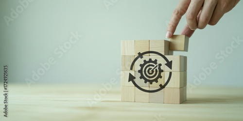 Hand placing final piece in continuous improvement process puzzle