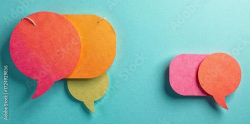 Vibrant paper speech bubbles, layered & overlapping , playful, dialogue, message