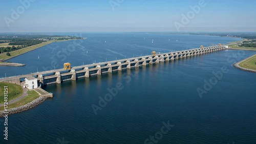 Wallpaper Mural Aerial view of a long concrete dam with gates on a wide river Torontodigital.ca