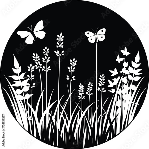 Silhouette of wildflowers and butterflies in a circle at nighttime