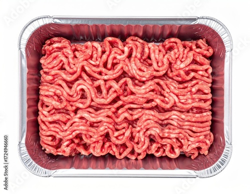 Overhead view of a rectangular aluminum tray containing a mound of fresh, raw ground beef