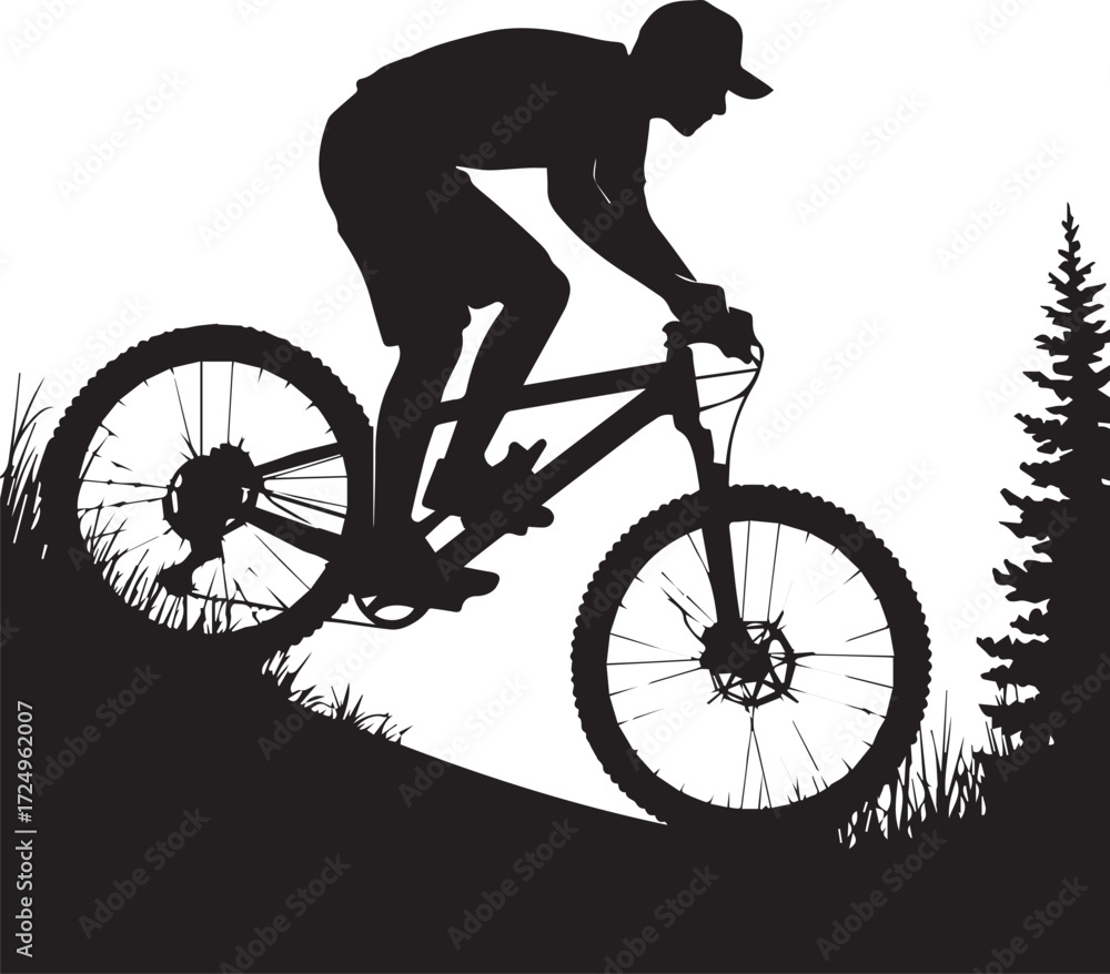 Fototapeta premium Dynamic silhouette of mountain biker riding downhill amidst trees and grass