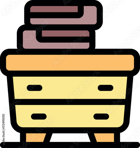 Wooden cabinet with folded towels stacked neatly on top