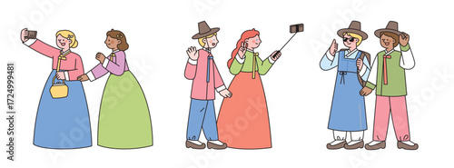 Foreign tourists wearing colorful hanbok take selfies and enjoy Korean traditional culture together.