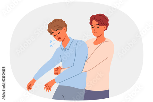 Man performs heimlich maneuver for choking friend, providing first aid to save human. Instructions for heimlich maneuver from guy rescuing patient at risk of dying due to blocked airway