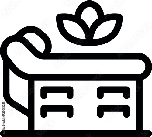 Massage table promoting relaxation and well being, ideal for spa and wellness centers