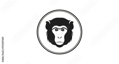 Black and white vector monkey face in a circle. Minimalist primate illustration for logos, icons, and designs conveying intelligence, nature, and wisdom