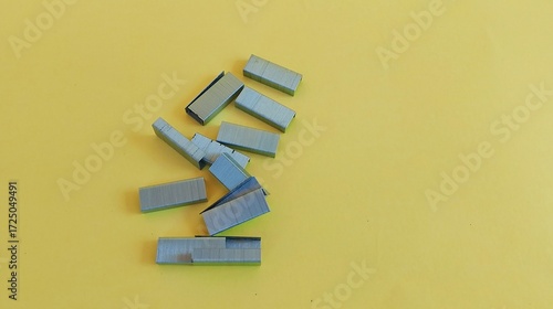 Staples on a yellow background
