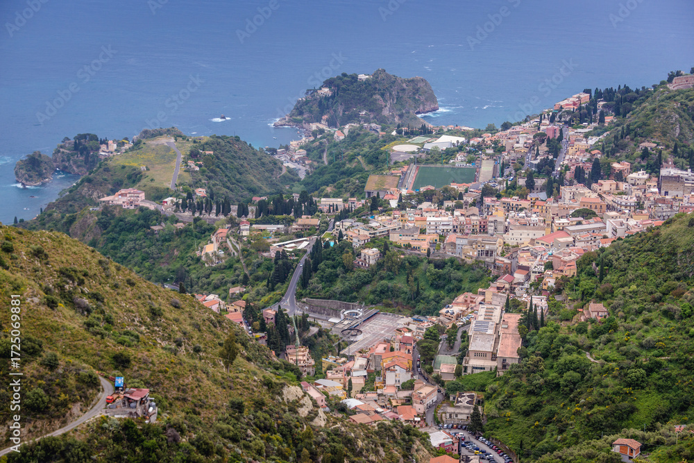 Fototapeta premium Aerial view on Taormina city seen from Castelmola, small town on Sicily Island, Italy